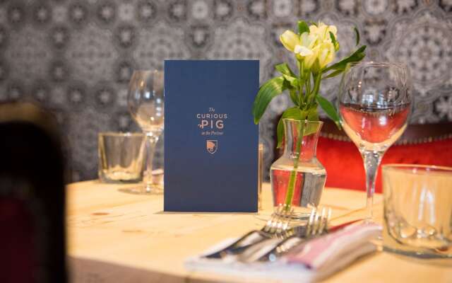 The Curious Pig in the Parlour