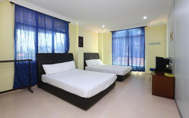 SPOT ON 89857 Azra Inn Rumah Tumpangan