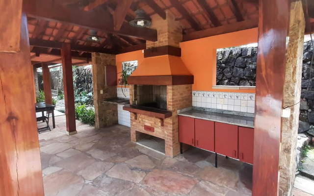 Casa 5 suítes com piscina e churrasqueira