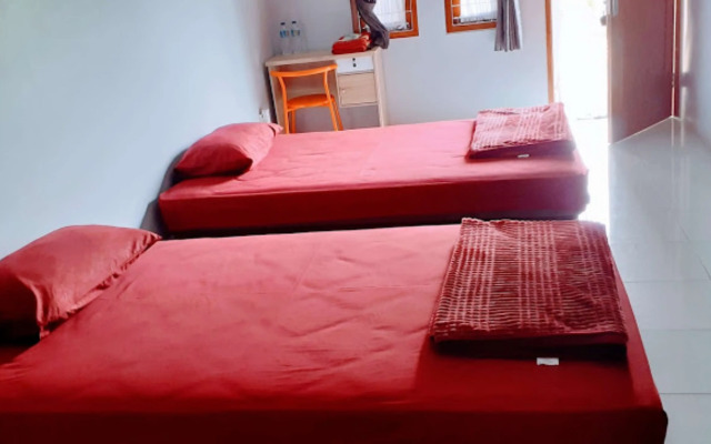 Nabila Syar i Guesthouse by ZUZU