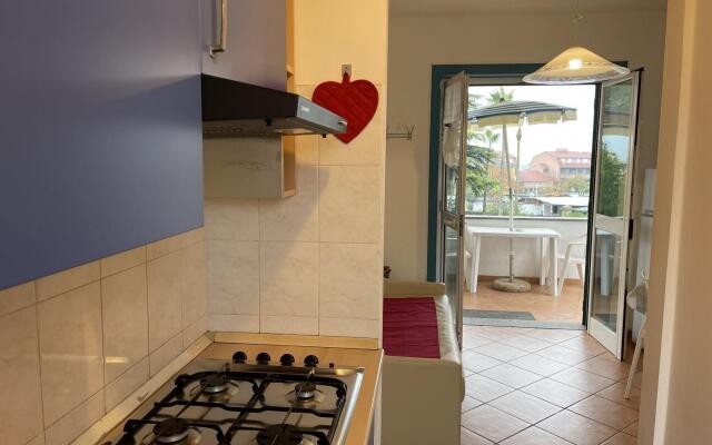 Snug holiday home in Loano with shared pool