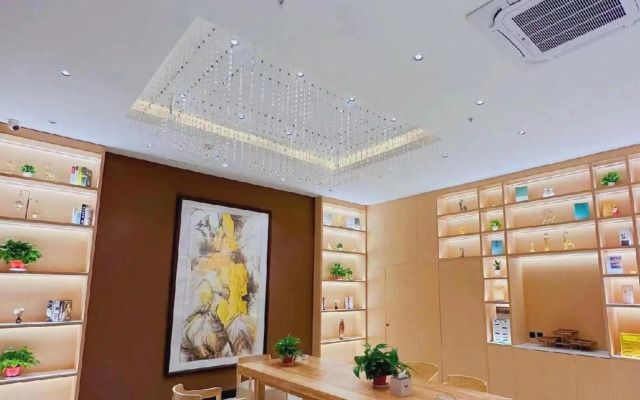 Wanjia Business Hotel (Zaozhuang Maoyuan)