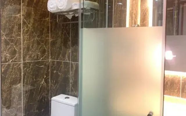 Chaoman Hotel (Suining Gymnasium Wanda Branch)