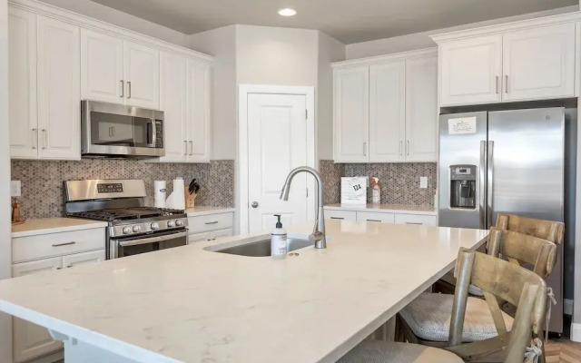 Mitchell's Place 4 Bedroom Apts by RedAwning