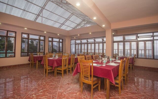 Townhouse OAK Hotel Regal Residency