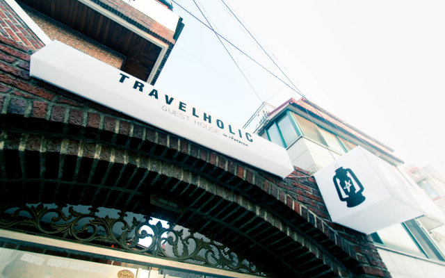 Travelholic Guesthouse - Hostel