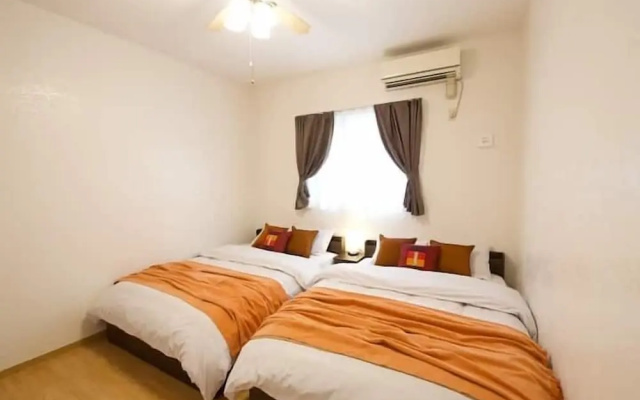 Kin Seaside Hills Town – Guest Rooms – Kin