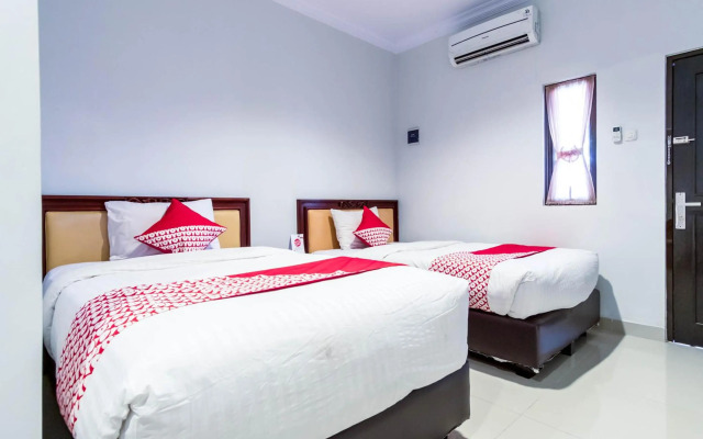 Super OYO 283 Helvetia Residence
