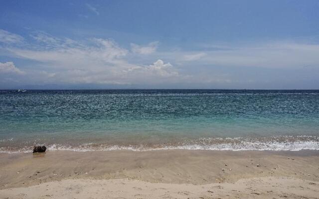 Road Beach Homestay by ZUZU