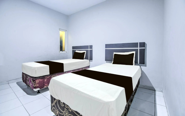 Hotel O Makassar near Mall Panakukang formerly Hotel Lucky Inn Makassar – Guest Rooms – Makassar