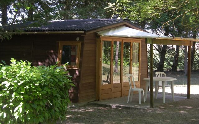 Camping Le Petit Lion - Lodges Bois