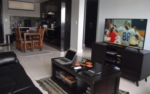 Highrise Windhoek apartment with skyline view, pool and gym