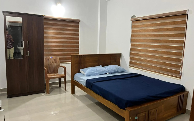 Biriyomz Residency, Kalpatta, Munderi, Low Cost Rooms and Deluxe Apartment