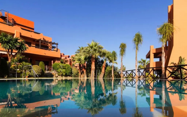 Precioso apartamento con jardín y piscina comunitaria