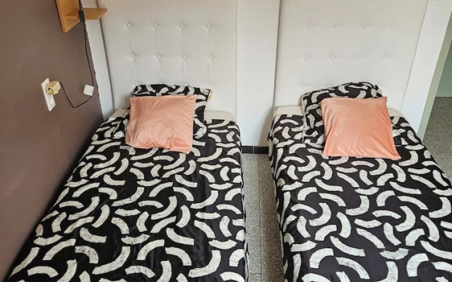 Chambre 2 lit simple avec balcon