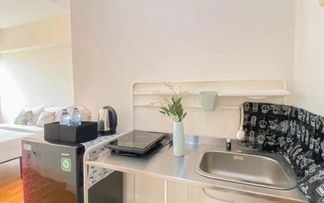 Cozy and Tranquil Studio at Podomoro Golf View Apartment