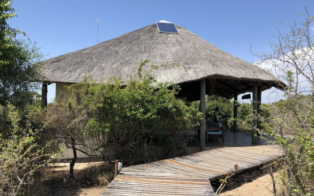 Saadani Safari Lodge - bush, river, beach