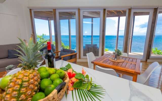 Awesome Over The Water Overlooking West End - Aire Agua 3 Bedroom Home by RedAwning