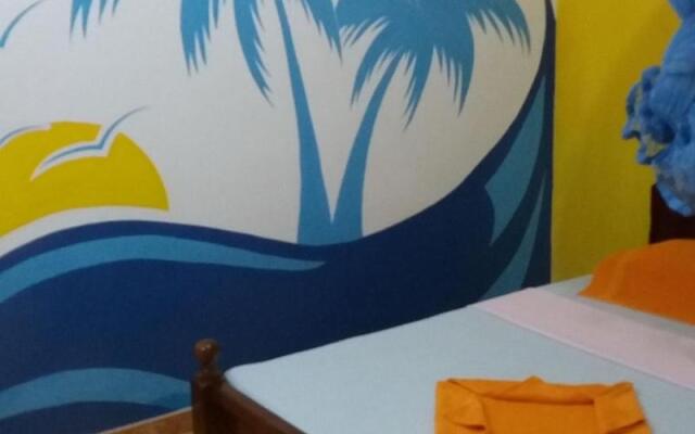 Malika's Yellow House
