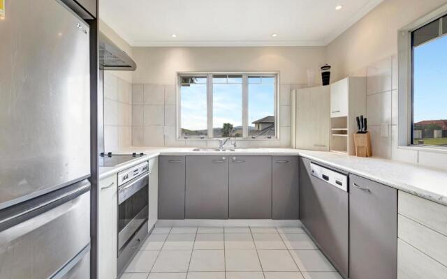 Cheerful 4 bedroom home with free parking.