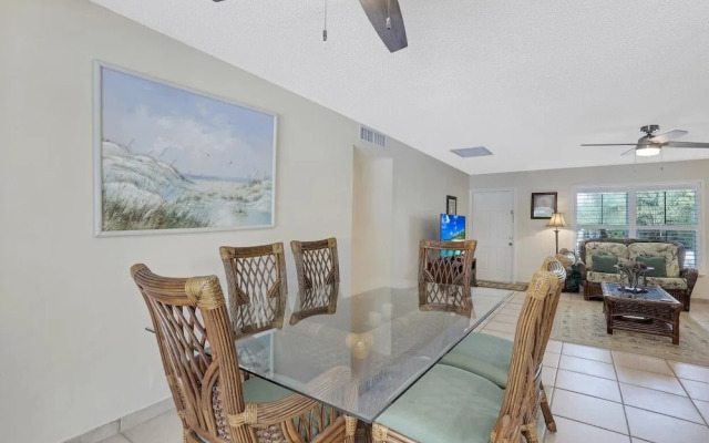 Cozy Home With Sunroom, Pool and Steps to Beach