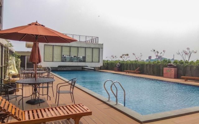 Homey and Cozy Living Studio Room at Dave Apartment