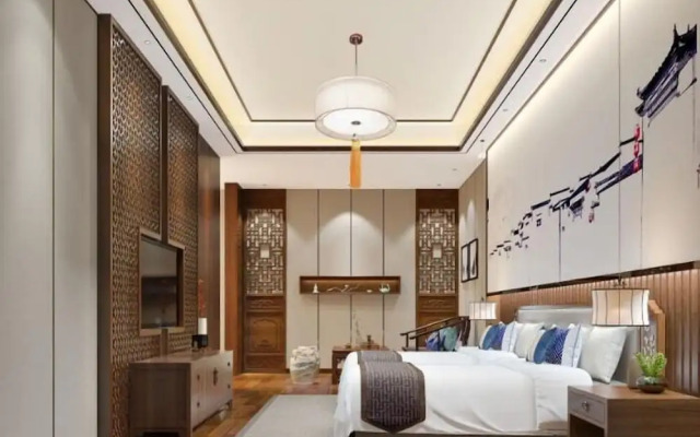 Xinhualian Lv Xin Gu Hotel