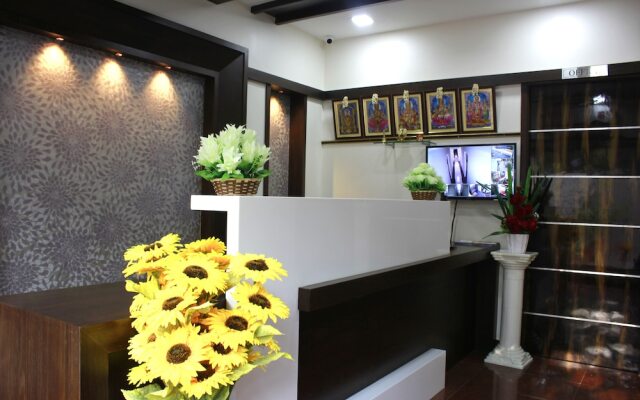 Rithikha Inn crest