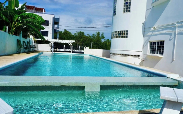 See Belize Waterside Sea View 2-bedroom Apartment w Balcony, Pool & Deck 2nd FL