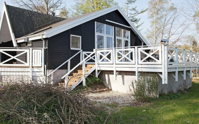 Rustic Holiday Home in Tikøb with Hot Tub & Sauna