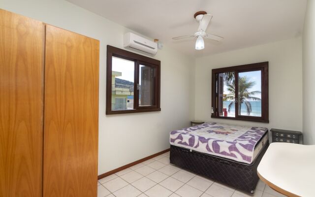 Aluguel Casa 4 quartos 1 suite frente mar 016