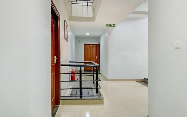 Capital O 11092 Shiv Enclave