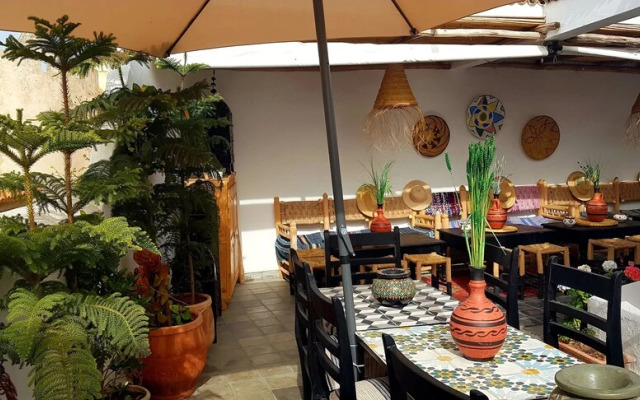 Art riad au bord de la mer