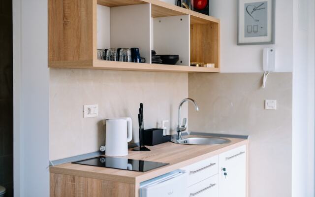 Art Deco City Walls Studios by DuHomes