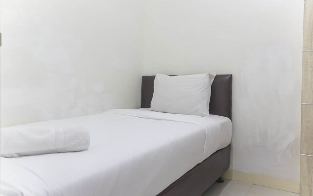 Homey and Comfy 2BR at Green Pramuka City Apartment