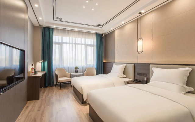 Magnotel Classic (Yongcheng Tuobin Road) – Guest Rooms – Shangqiu