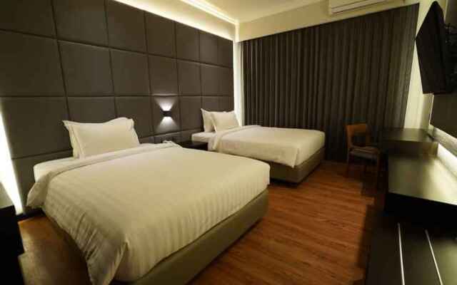 De Lobby Suite Hotel