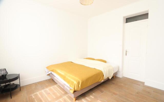 Coeur de ville, T2 cosy & élégant avec jardin