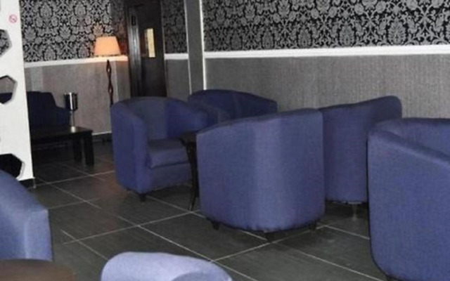 De Brass Suites Hotel