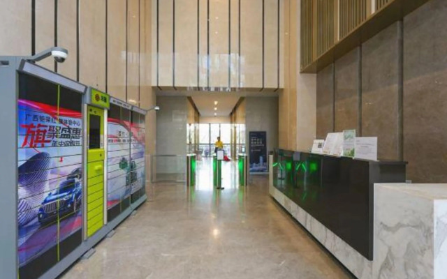 Qing shi guang apartment(greenland Central Plaza store)