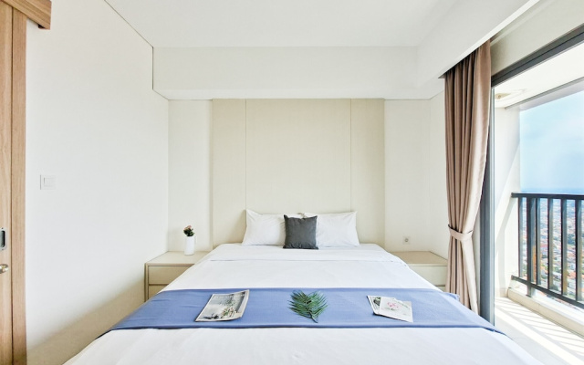 Wooden Accents 1Br Without Living Room At Bintaro Embarcadero Apartment