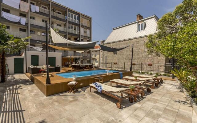 Evala luxury rooms with pool and garden
