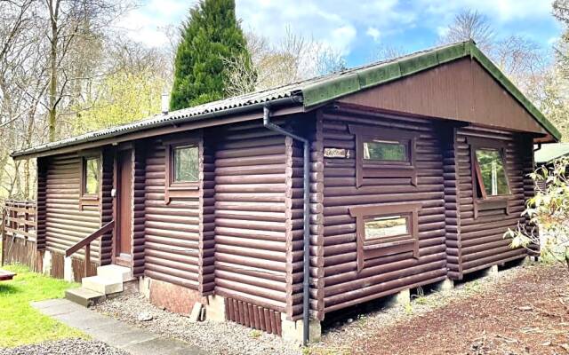 Riverside log cabins