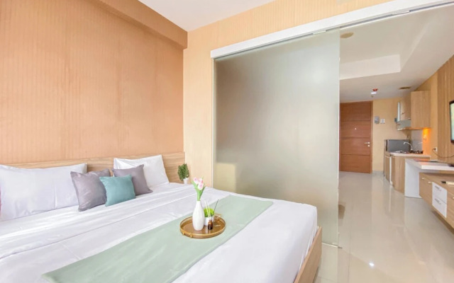 Homey and Comfortable 1BR Apartment at Dago Suites