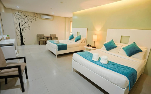 Holiday Suites Business District (Empire Suites Hotel)