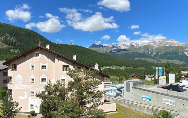 Dachwohnung im Alpenstil, 60m2 für 2P, mit Garage BM186