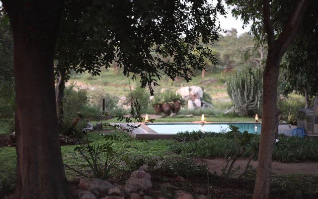 Ivory Wilderness River Rock Lodge