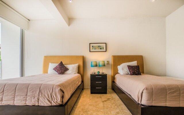 Magia Playa 202 A 2 Bedroom Condo by RedAwning