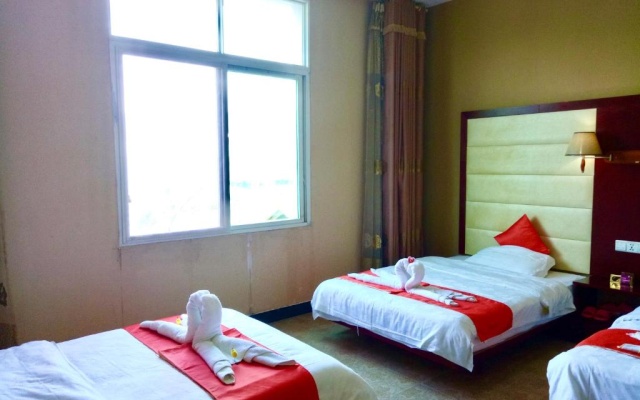 XiShuangBanNa International Aerial Garden South of Mekong River Business Hotel 傣江南商务酒店 – Guest Rooms – Xishuangbanna