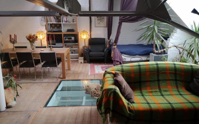 Artistic loft apartment with big sun terrace